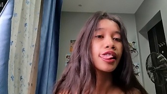 A Petite Asian Girl With A Small Frame
