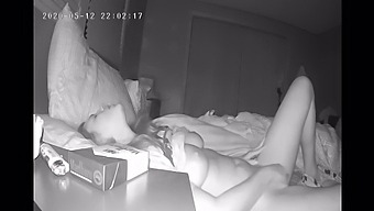 A Reserved Woman Masturbates In Her Room Before Bedtime, Captured By A Concealed Camera